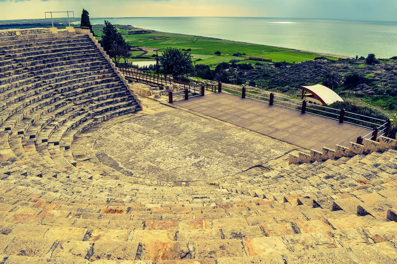The restored Greco-Roman theatre at Kourion, its stone seats facing the sea